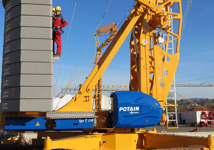 Potain self-erecting tower crane in action